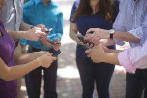 employees all using cell phones