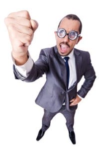 man in suit shaking his fist