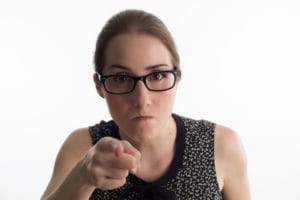 Angry woman pointing her finger