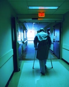 elderly man on crutches at risk for one of the patient falls