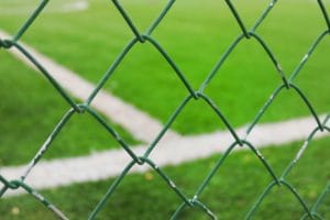 LNC success is impeded by a chain link fence