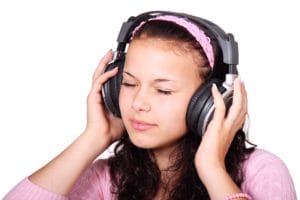 girl wearing headphones