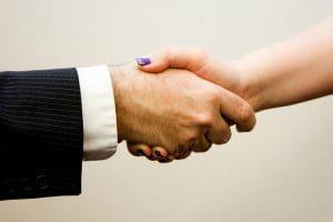 handshake at trade show