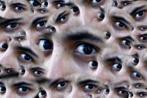 face surrounded by eyes in 5 types of fears