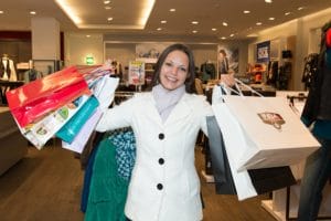 woman holding shopping bags